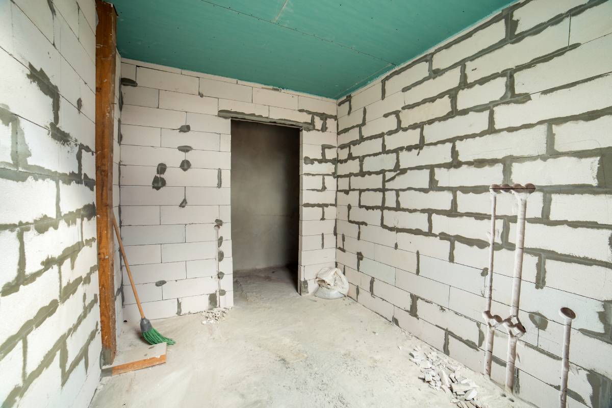 What is in a plaster wall? 